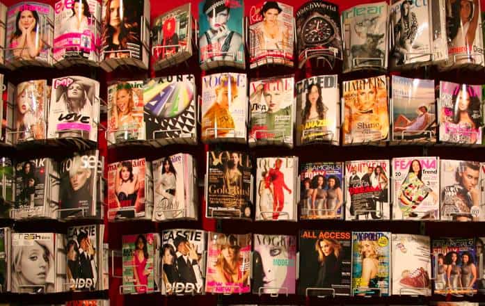 a group of magazines on a wall