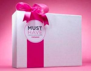 a white box with a pink bow