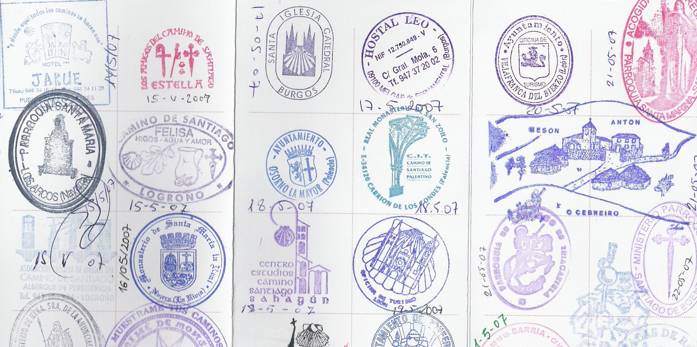 a group of stamps on a book