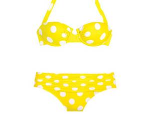 a yellow garment with white polka dots