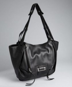 a black purse with straps