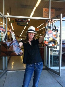 a woman holding two bags