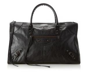 a black leather bag with a handle