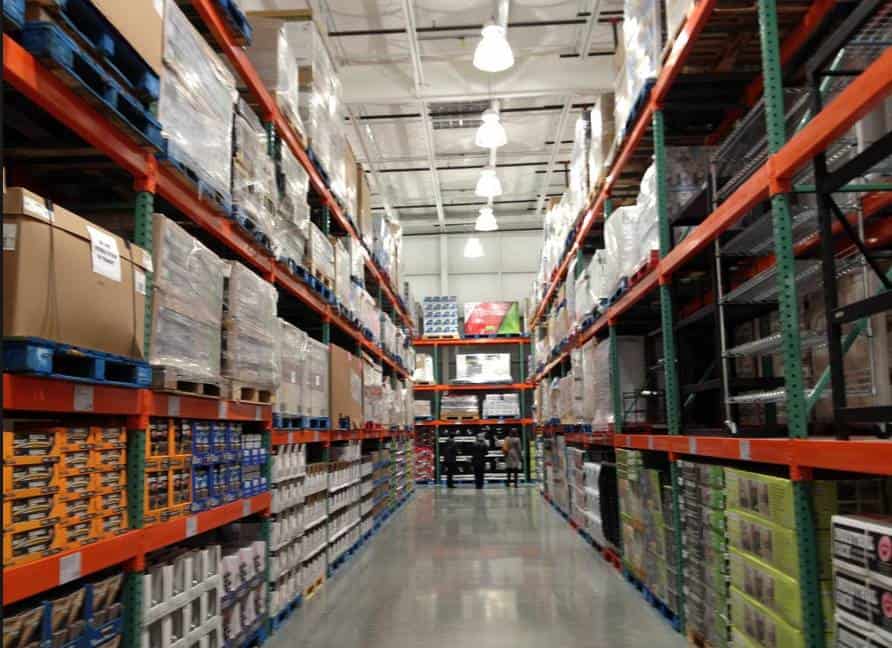 a warehouse with shelves of goods