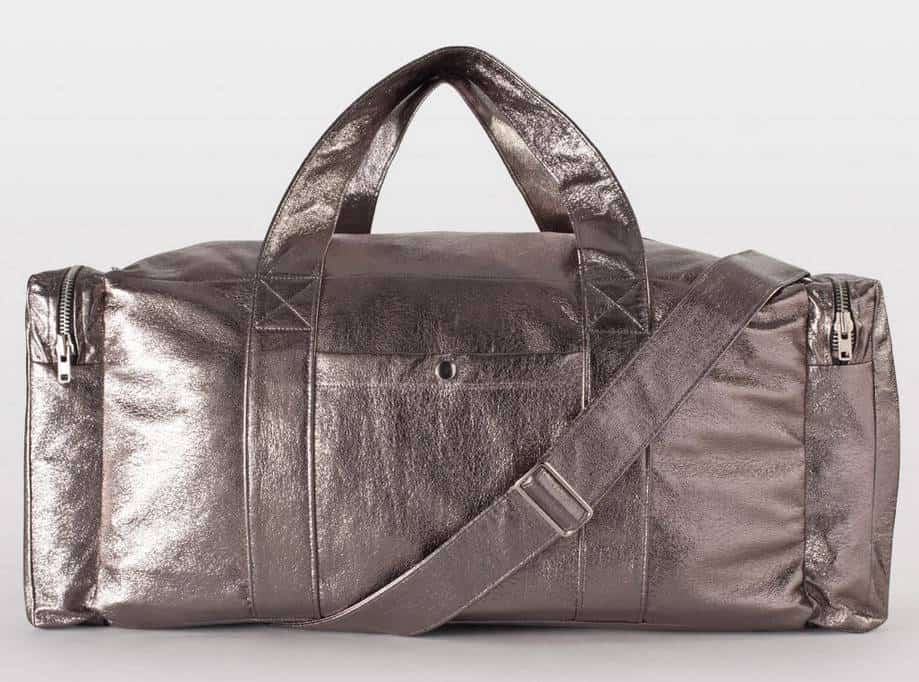 a silver duffel bag with a strap