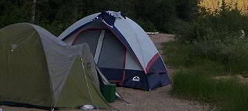 a tent and a green tent