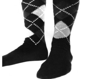 a pair of black socks with white and grey argyle pattern