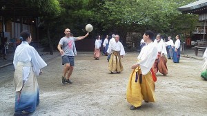 a group of men playing with a ball