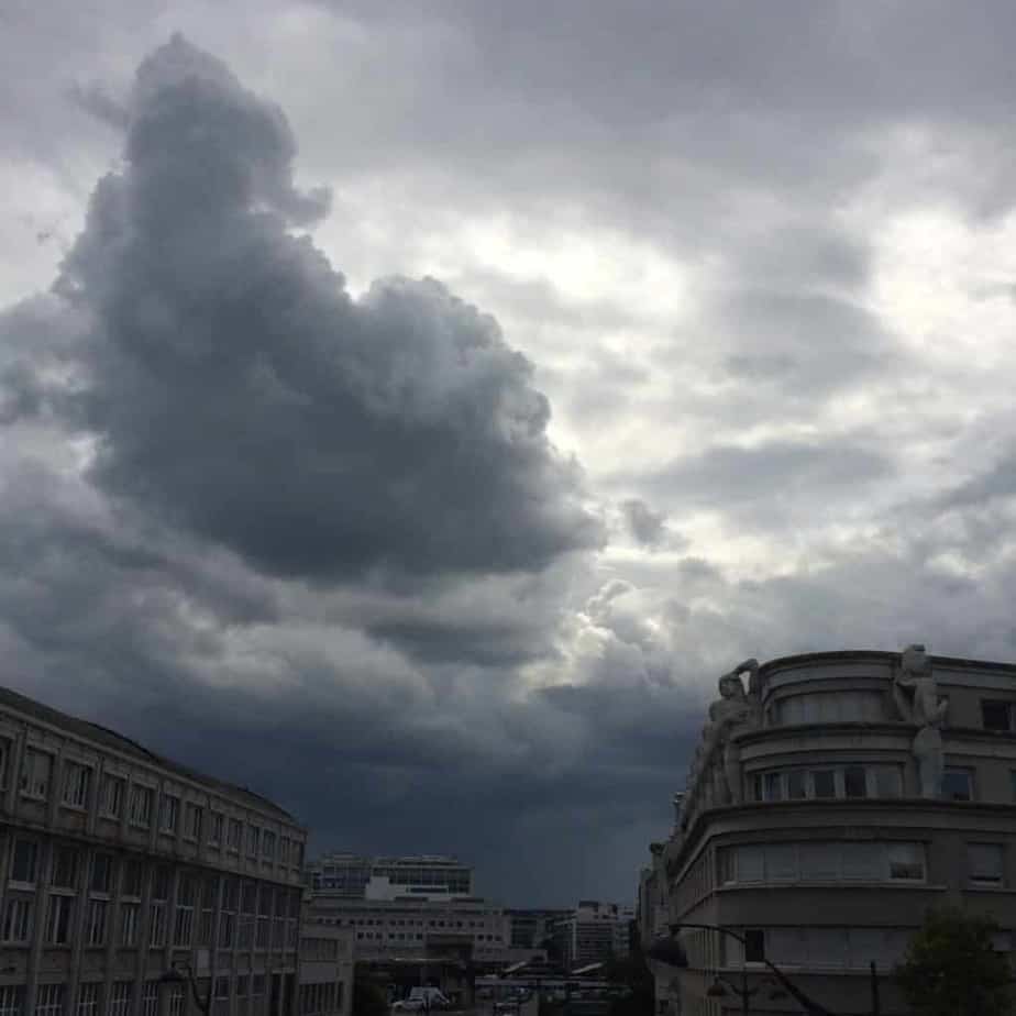 a cloudy sky over a city