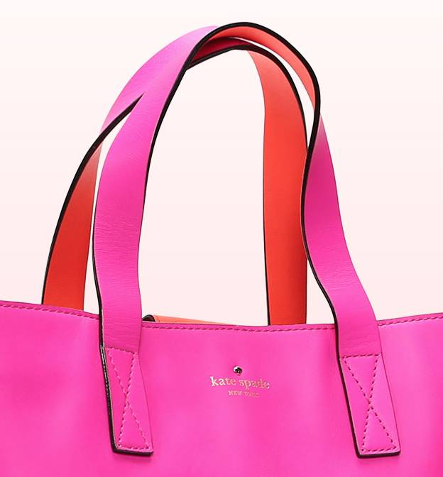 a pink purse with a handle