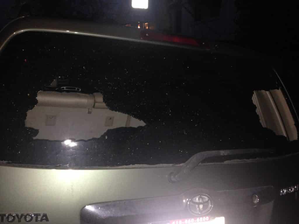 a broken windshield of a car