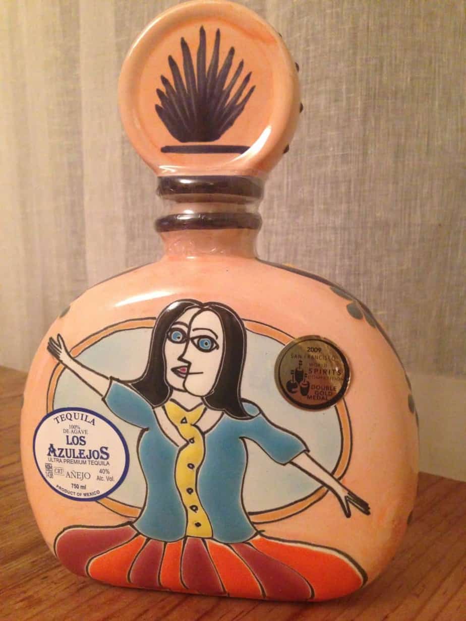 a bottle of alcohol with a woman on it