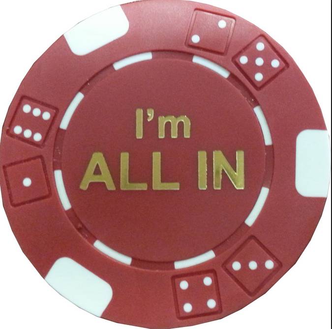 a red and white poker chip